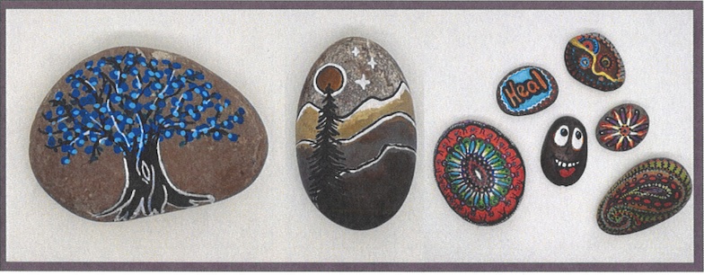 3 rocks of various sizes that have been decoratively paomted