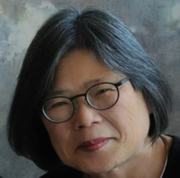 image of Asian woman, short hair and glasses.